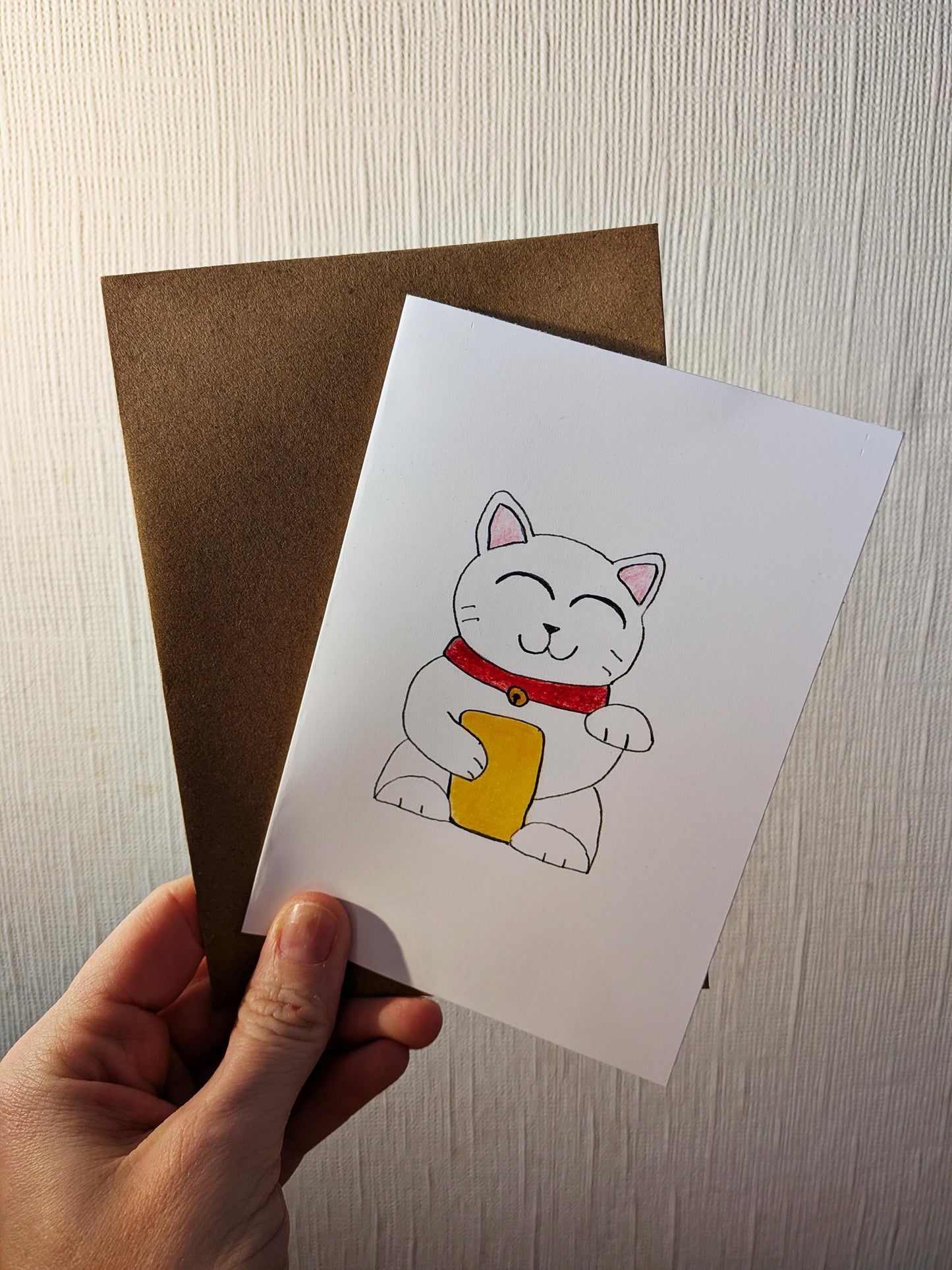 Lucky Waving Cat Card – A6 Printed Greeting Card – Hand Drawn Coloured Pencil Art