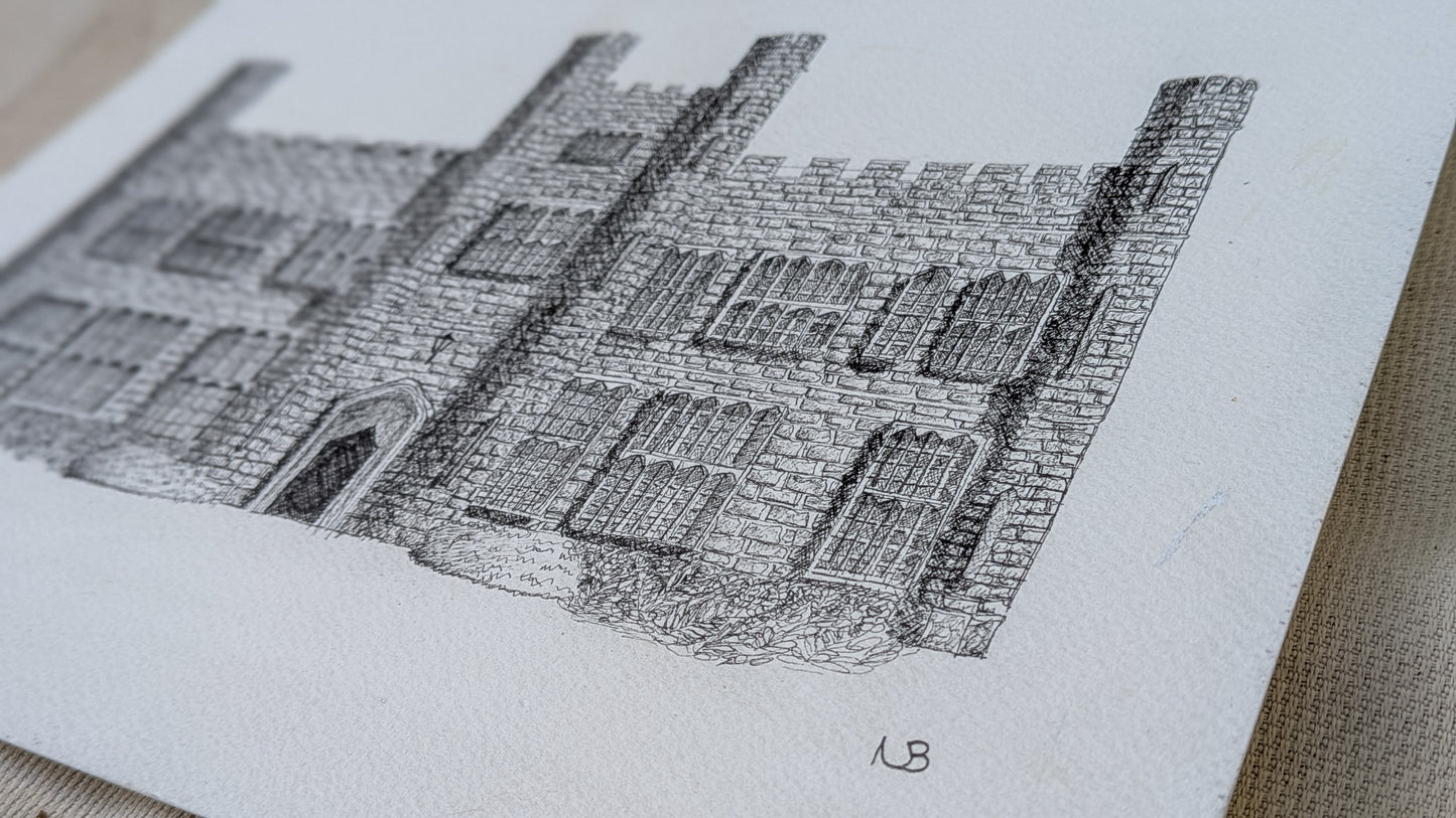 Detailed black and white drawing of a castle on a textured paper background