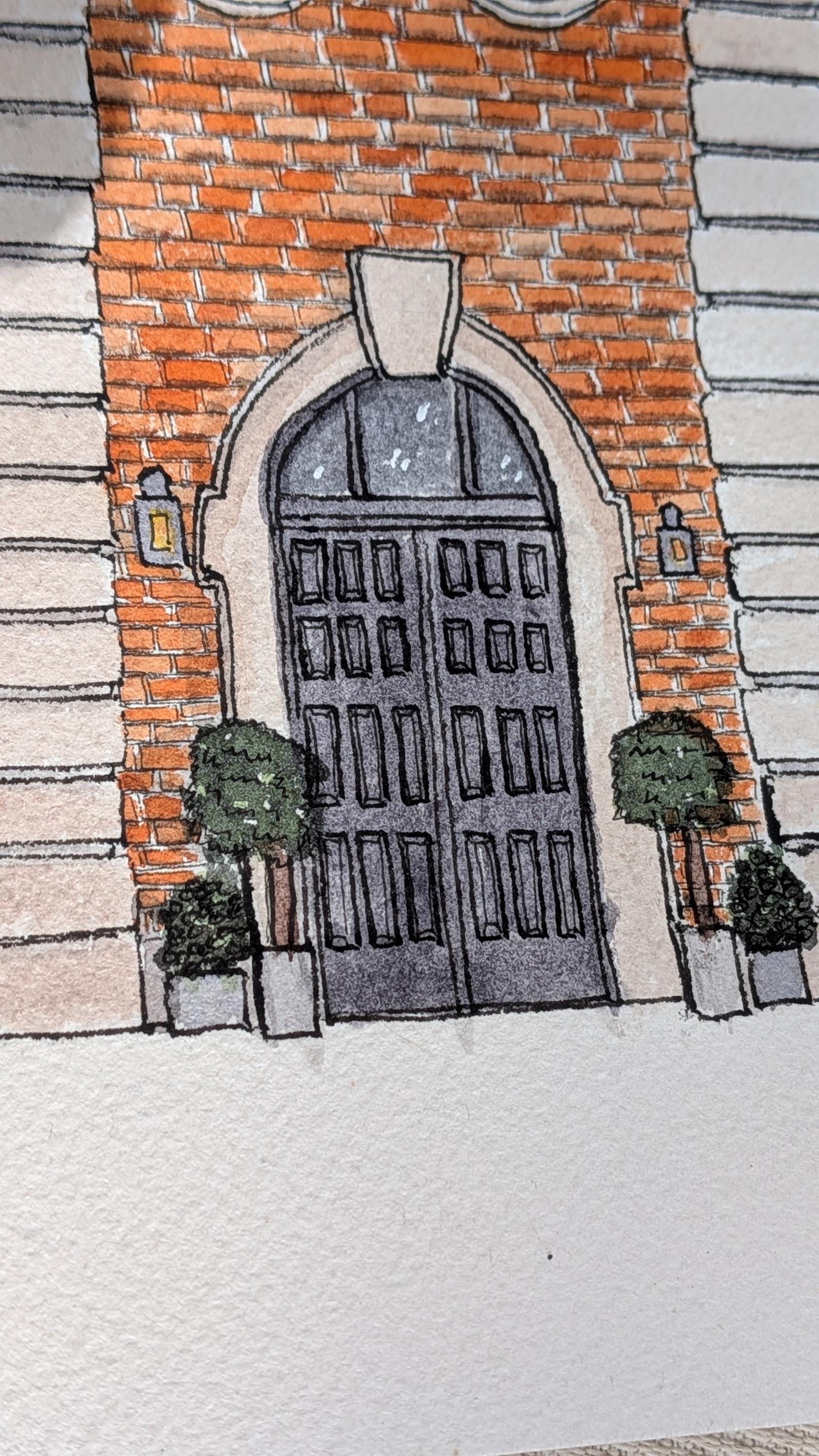 a painting of a black door of a large red brick wedding venue