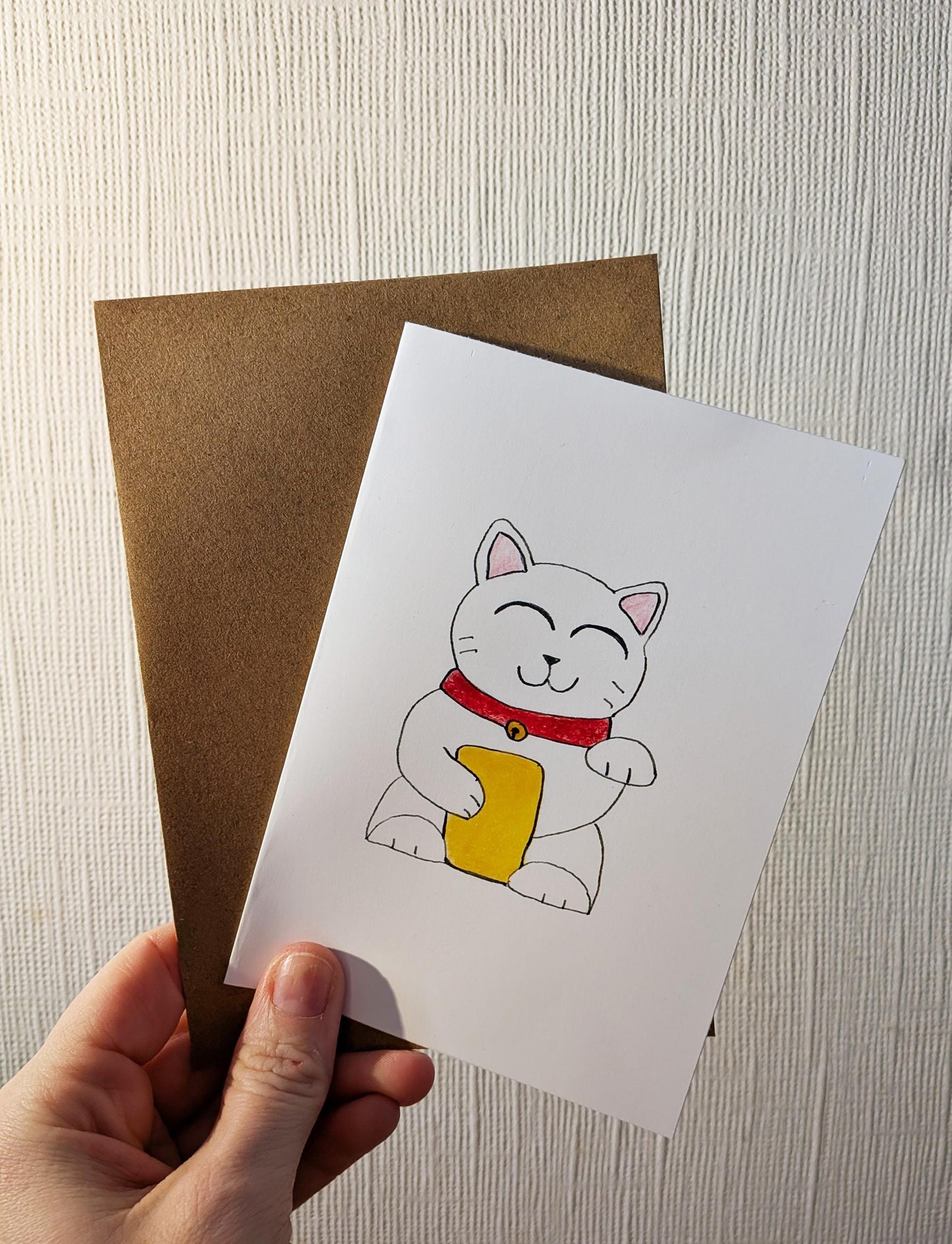 Lucky Waving Cat Card – A6 Printed Greeting Card – Hand Drawn Coloured Pencil Art