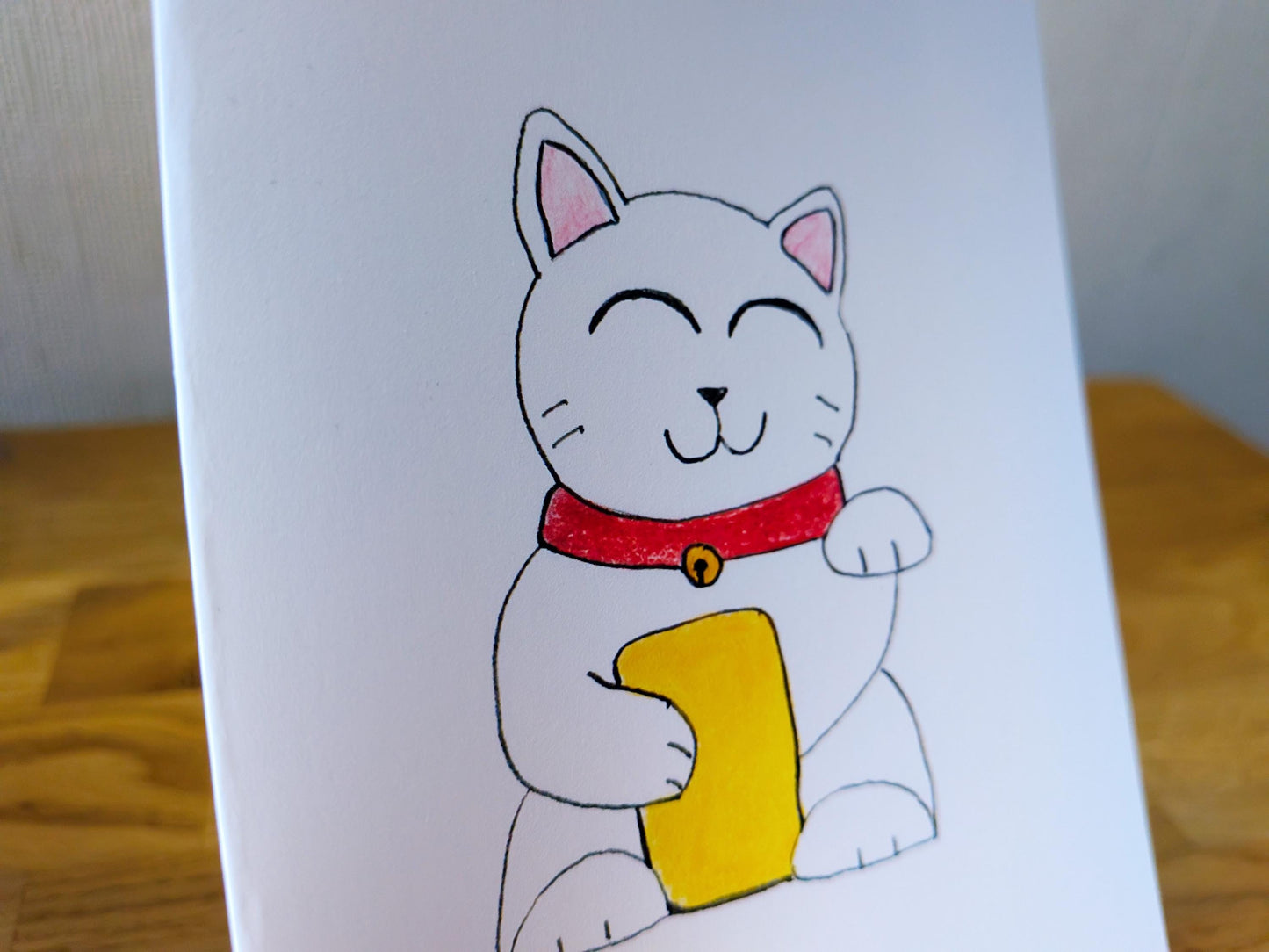 Lucky Waving Cat Card – A6 Printed Greeting Card – Hand Drawn Coloured Pencil Art
