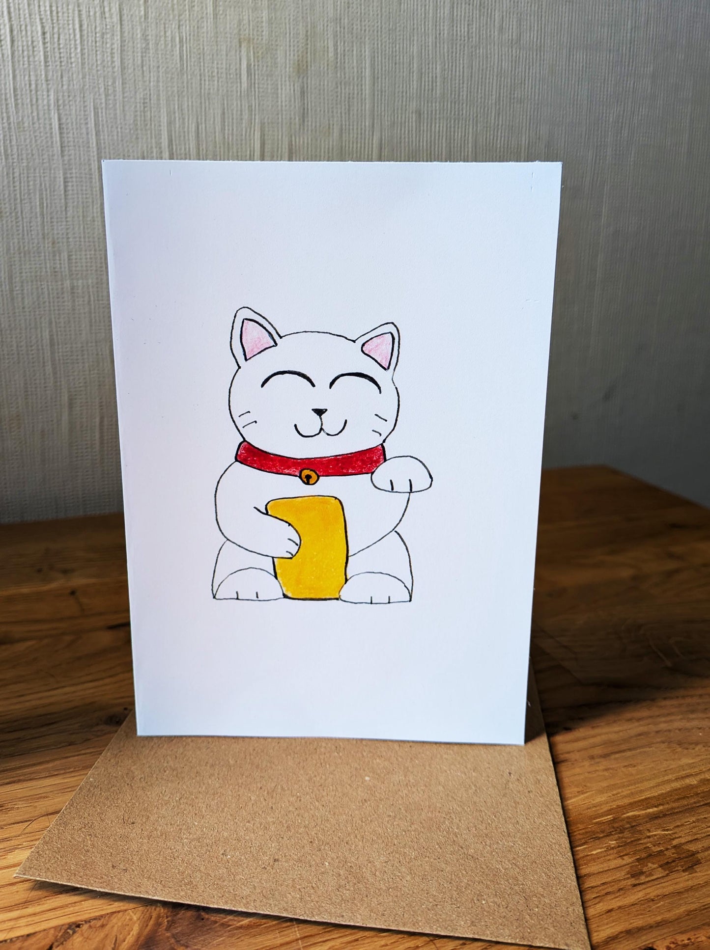 Lucky Waving Cat Card – A6 Printed Greeting Card – Hand Drawn Coloured Pencil Art